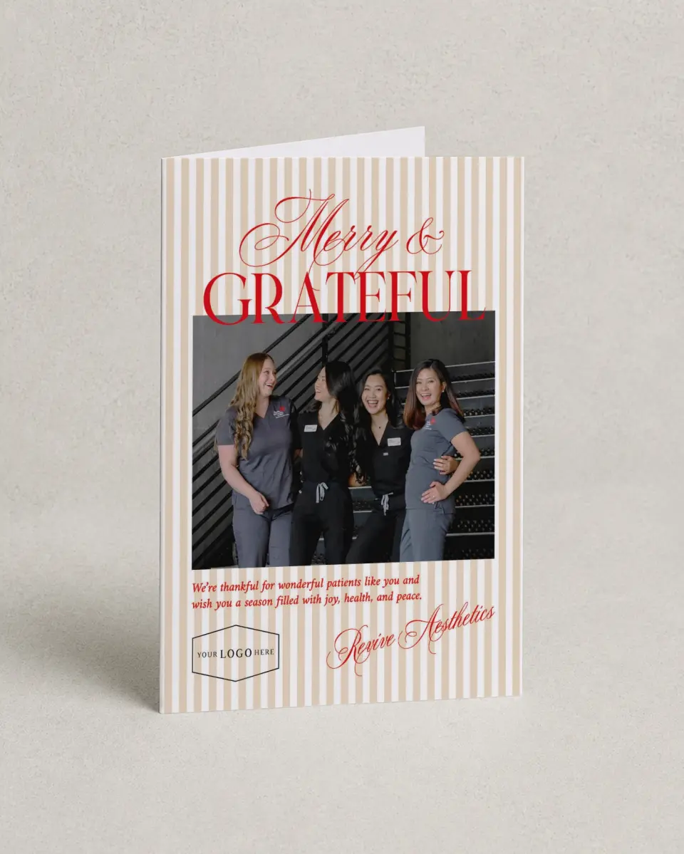 This is a 4.8" x 6.8" Folded Christmas Card called Grateful Wishes printed in full color with Rose Gold foil