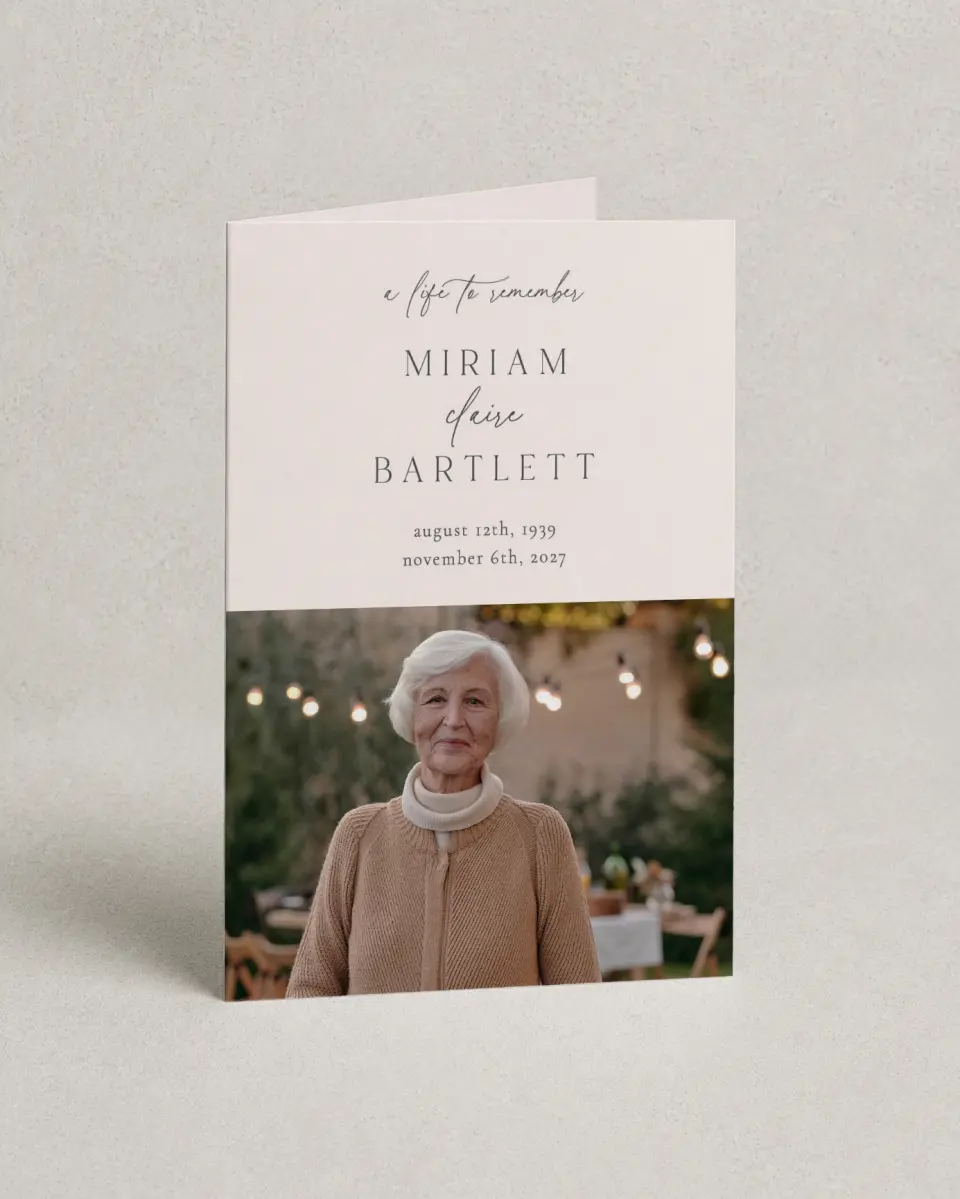 This is a 4.8" x 6.8" Folded Funeral Program called Cherished Life printed in full color with Silver foil