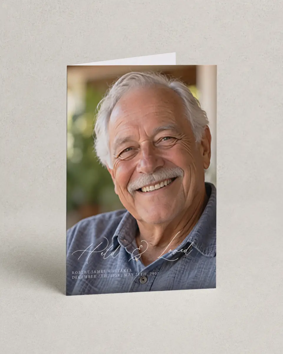 This is a 4.8" x 6.8" Folded Funeral Program called Held & Loved printed in full color with Silver foil