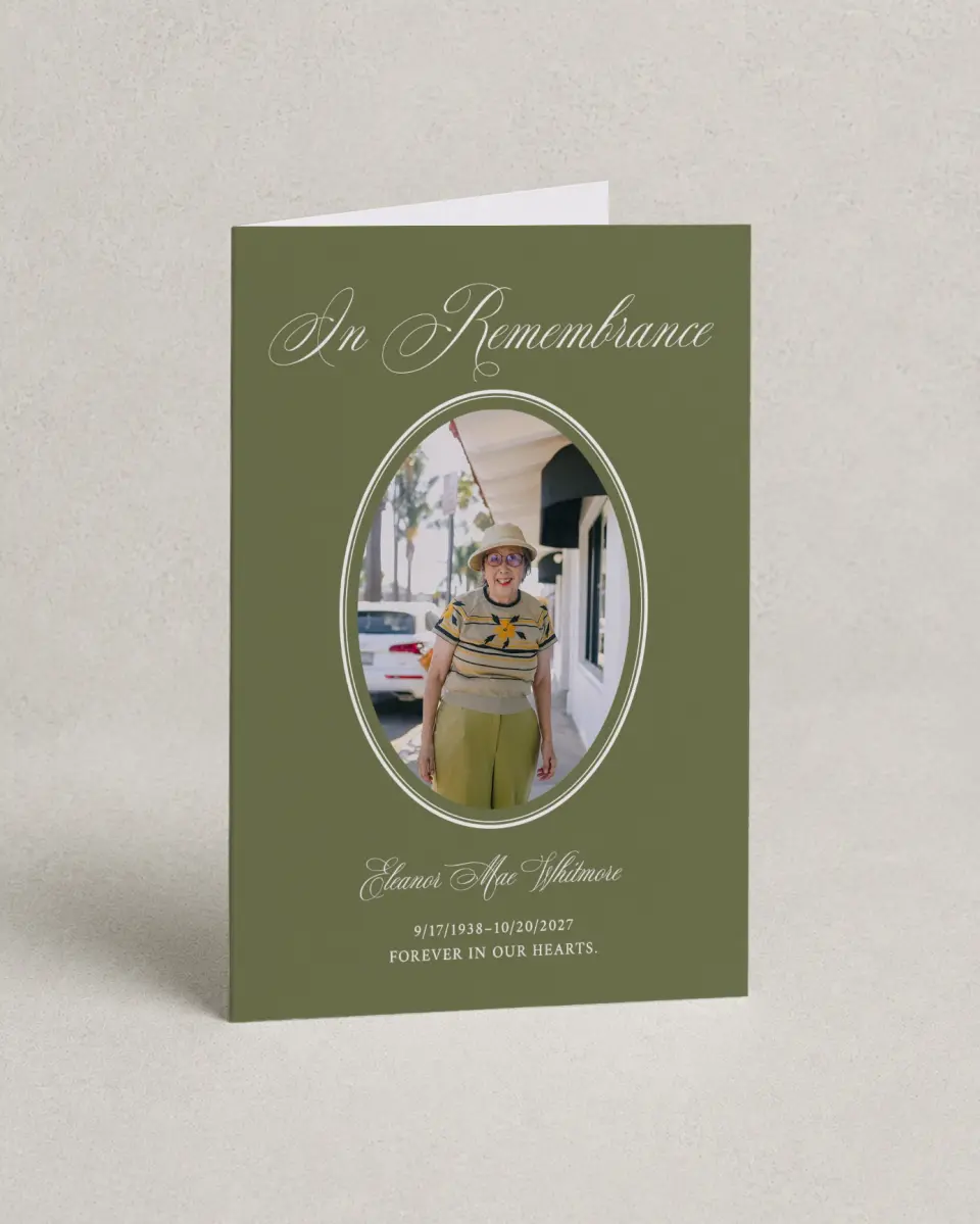 This is a 4.8" x 6.8" Folded Funeral Program called In Remembrance printed in full color with Silver foil