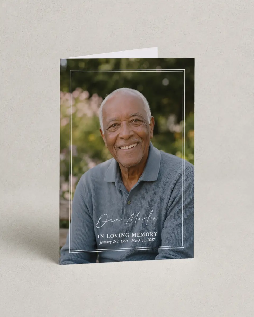 This is a 4.8" x 6.8" Folded Funeral Program called In Memory printed in full color with Silver foil
