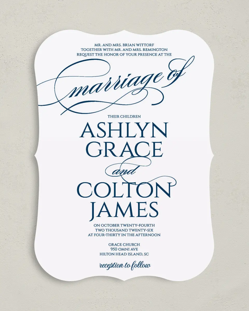 This is a 5" x 7" Bracket Wedding Invitation called Glam District printed in full color with Silver foil on Luxe Satin (coated) paper