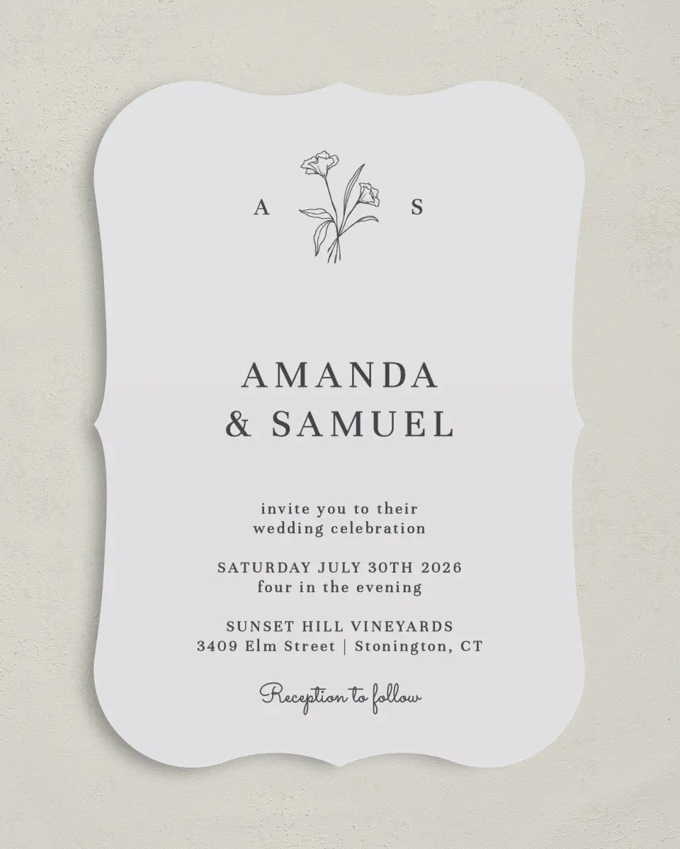 This is a 5" x 7" Bracket Wedding Invitation called Monogram Bloom printed in full color on Premium Smooth paper