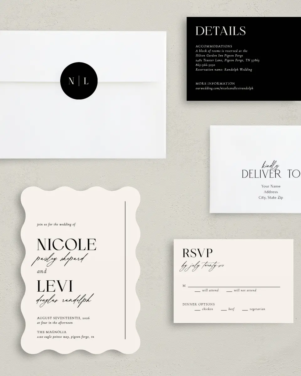 This is a 5" x 7" Wavy Wedding Invitation called The Nicole printed in full color with Silver foil on Luxe Satin (coated) paper