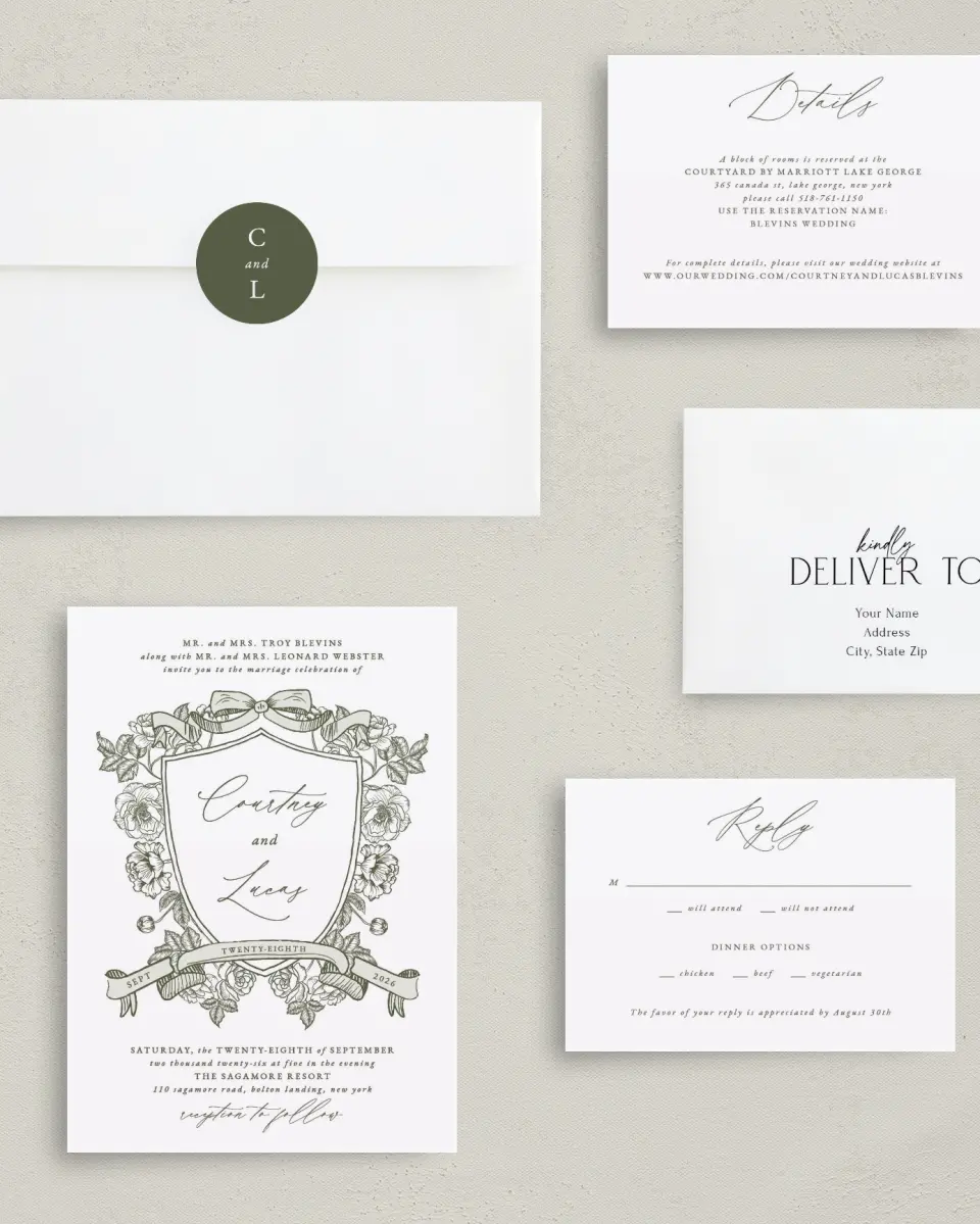 This is a 5" x 7" Classic Wedding Invitation called Elegant Crest printed in full color with Silver foil on Luxe Satin (coated) paper