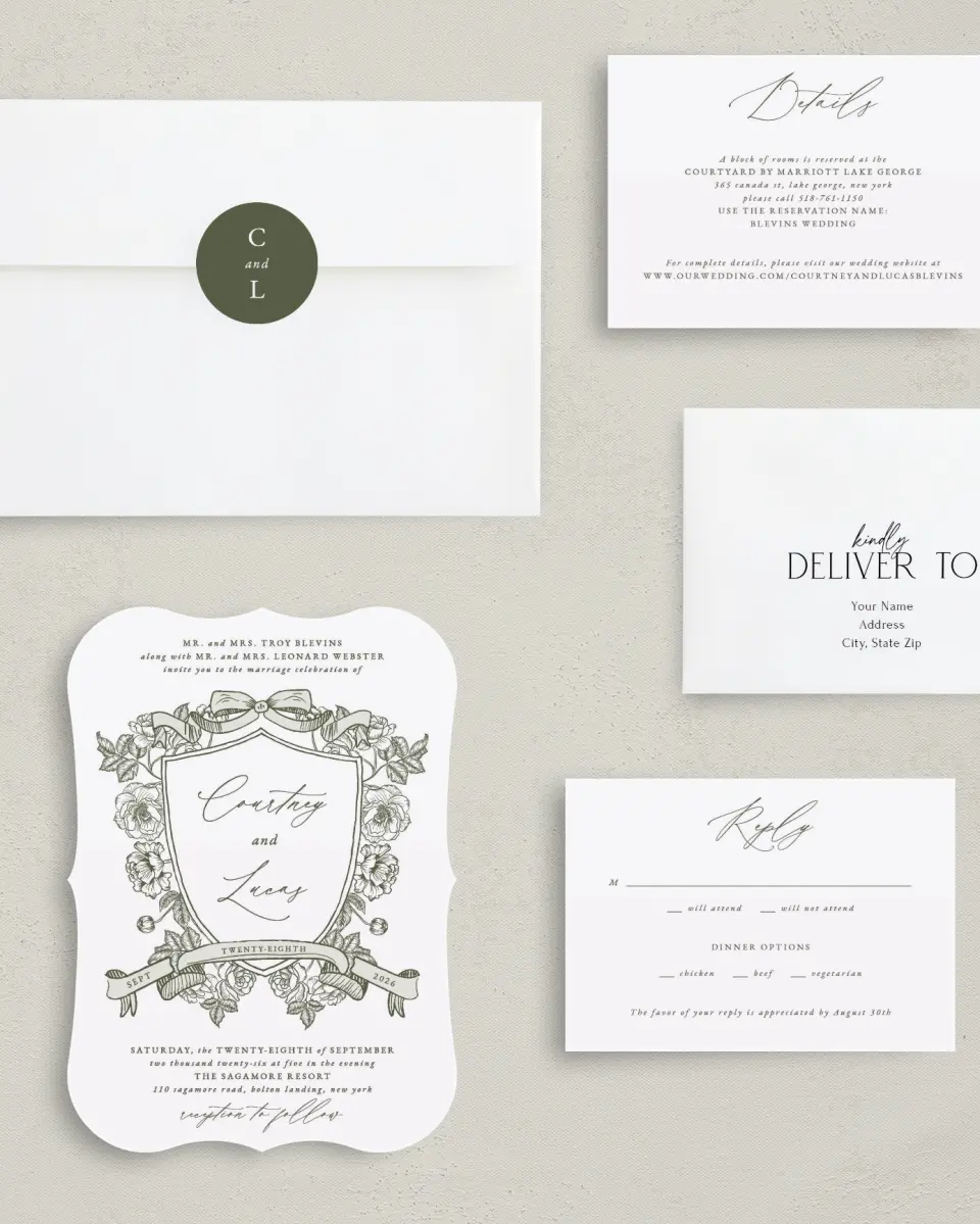 This is a 5" x 7" Bracket Wedding Invitation called Elegant Crest printed in full color with Silver foil on Luxe Satin (coated) paper