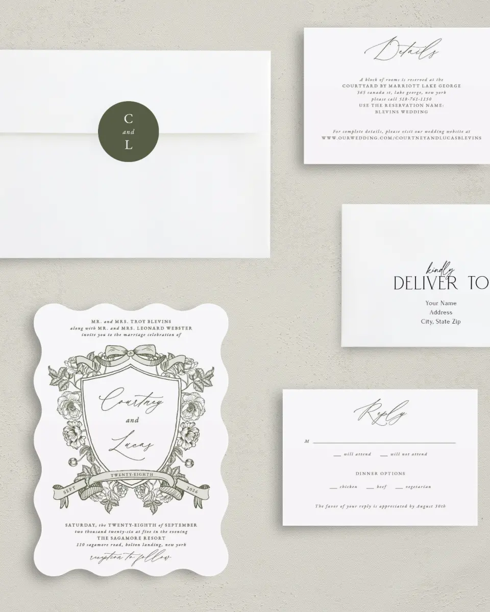 This is a 5" x 7" Wavy Wedding Invitation called Elegant Crest printed in full color with Silver foil on Luxe Satin (coated) paper