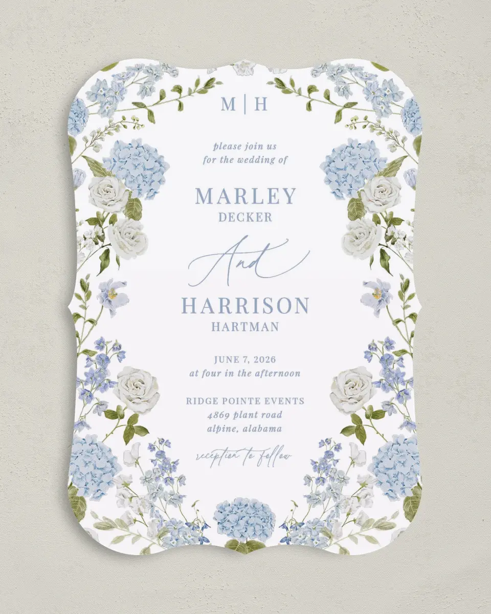 This is a 5" x 7" Bracket Wedding Invitation called Blue Blossoms printed in full color with Silver foil on Luxe Satin (coated) paper