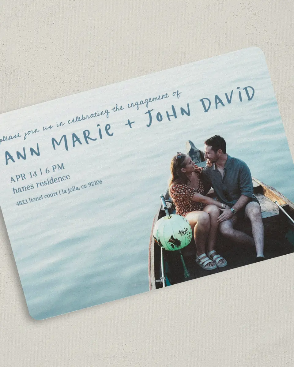 This is a 5" x 7" Engagement Party Invitation called Reflective Love printed in full color with Silver foil on Luxe Satin (coated) paper