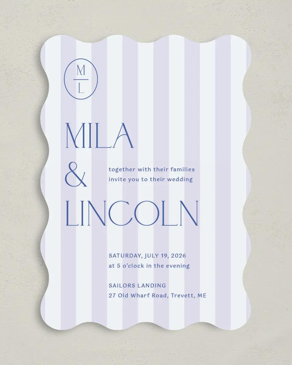 This is a 5" x 7" Wavy Wedding Invitation called The Mila printed in full color with Silver foil on Luxe Satin (coated) paper