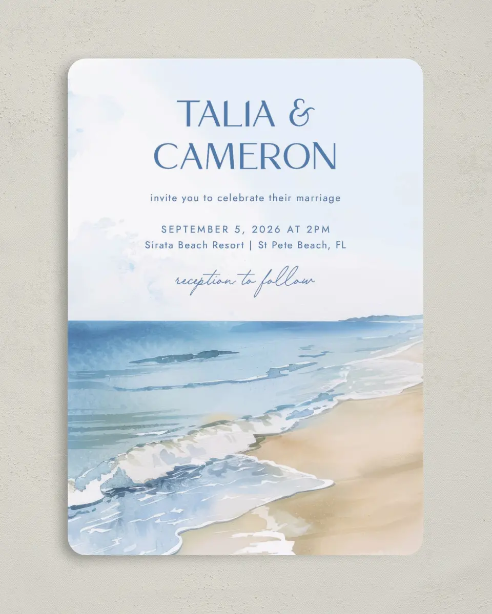 This is a 5" x 7" Rounded Wedding Invitation called Seaside Serenade printed in full color with Gold foil on Luxe Satin (coated) paper