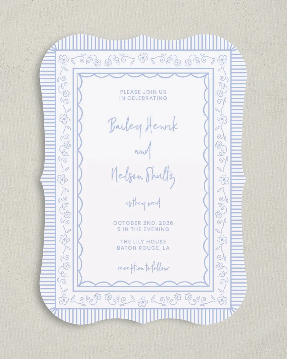 This is a 5" x 7" Bracket Wedding Invitation called Framed in Flowers printed in full color with Silver foil on Luxe Satin (coated) paper