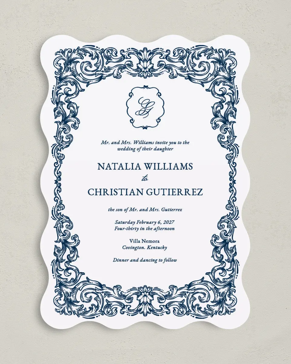 This is a 5" x 7" Wavy Wedding Invitation called Heirloom Crest printed in full color with Gold foil on Premium Smooth paper