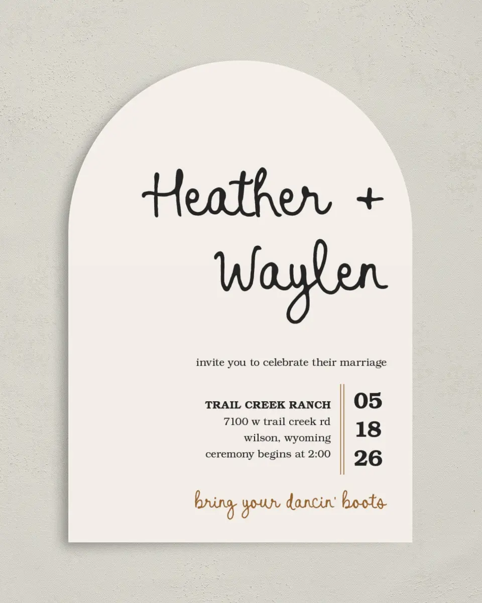 This is a 5" x 7" Arch Wedding Invitation called Head Over Boots printed in full color on Luxe Satin paper