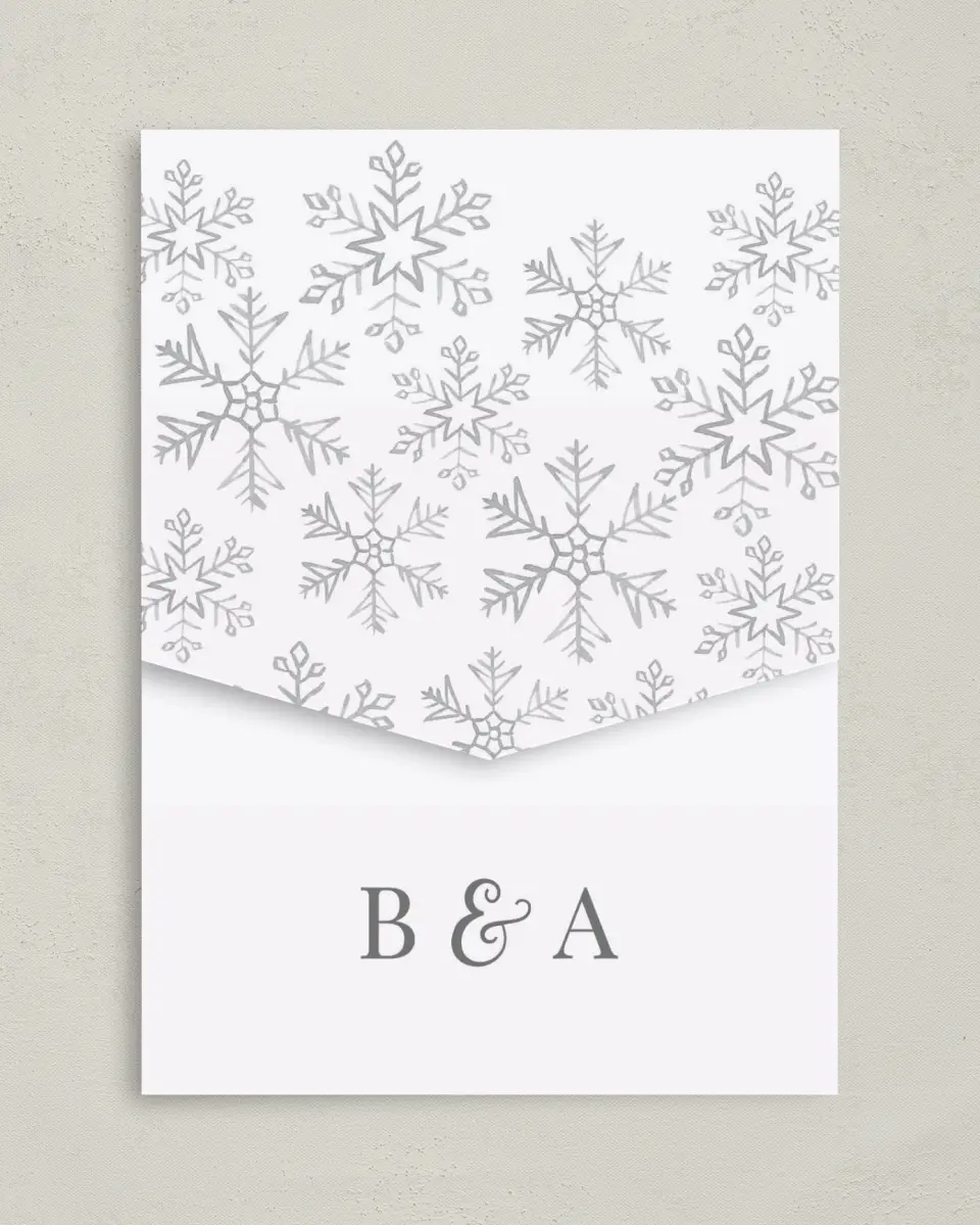 This is a 5¼" x 7¼" Folded Pocket Wedding Invitation called Sweet Snowflakes printed in full color on Premium Smooth paper