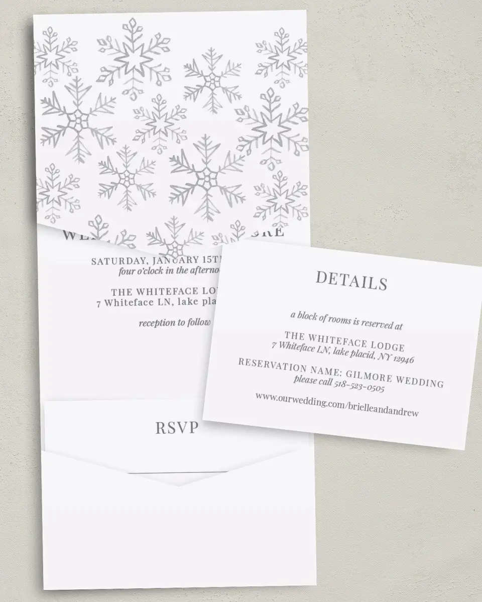This is a 5¼" x 7¼" Folded Pocket Wedding Invitation called Sweet Snowflakes printed in full color with Gold foil on Luxe Satin (coated) paper