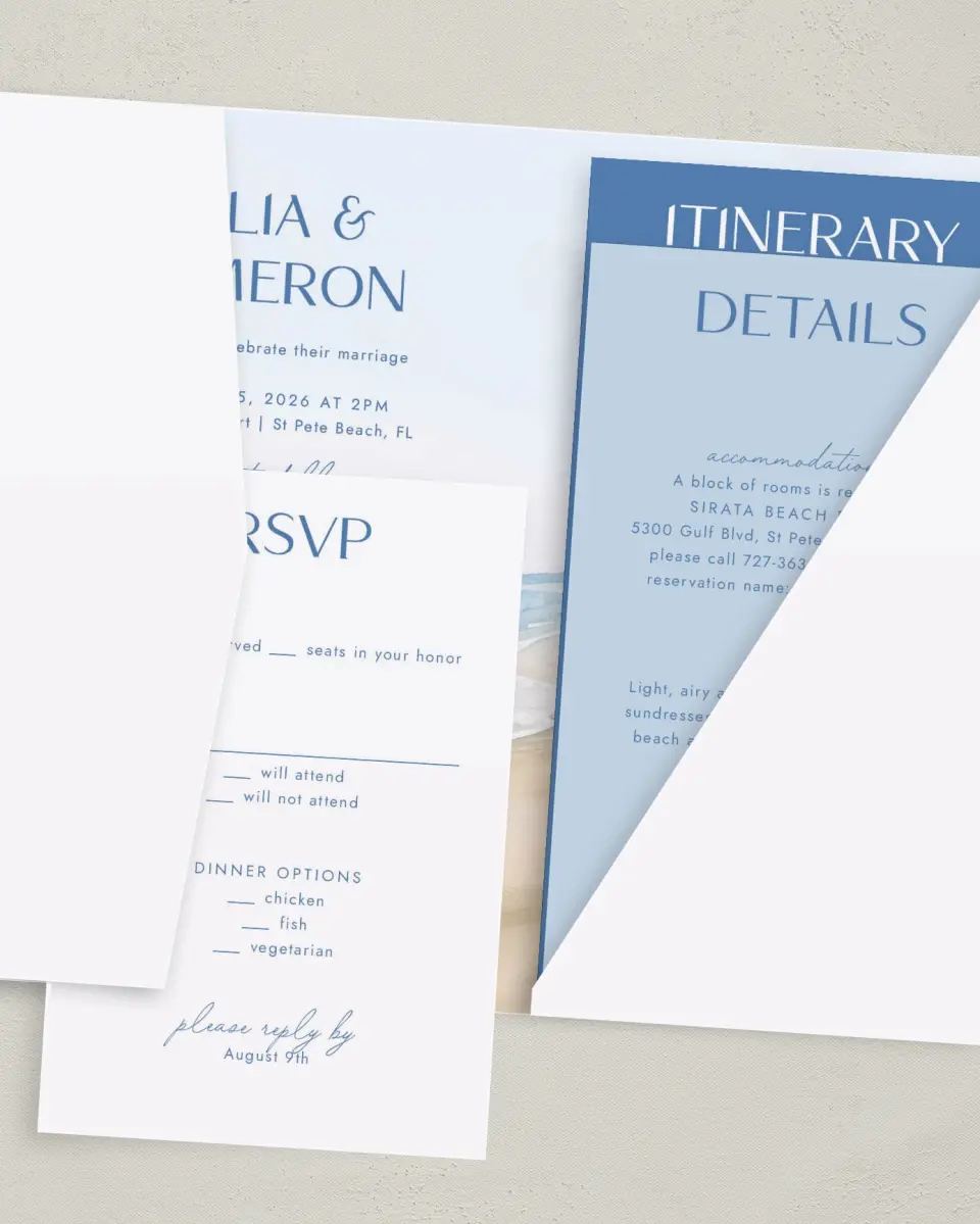 This is a 5" x 7⅞" Pocket Wedding Invitation called Seaside Serenade printed in full color with Gold foil on Luxe Satin (coated) paper