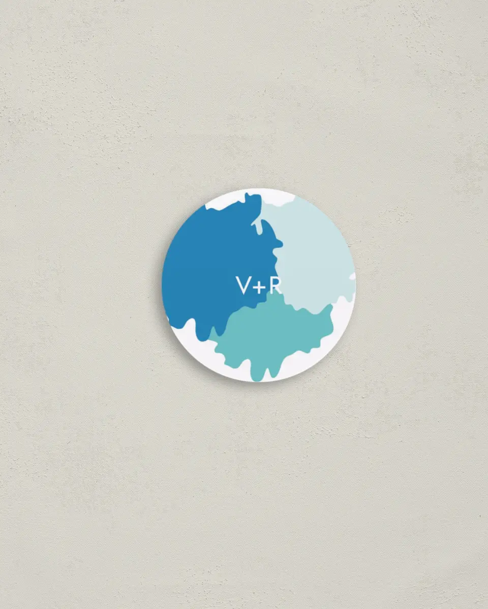 This is a 2" circle Envelope Seal called Making Waves printed in full color