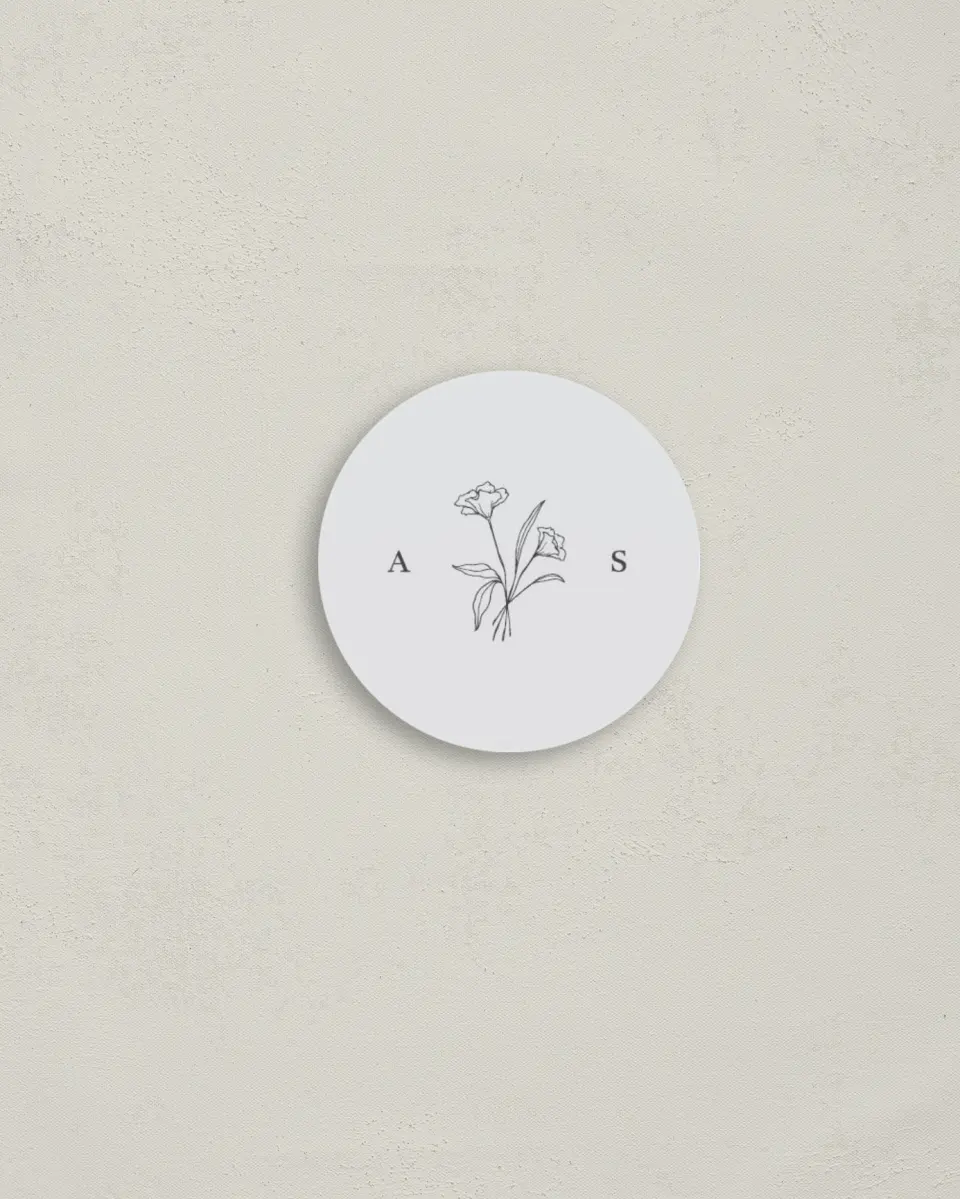 This is a 2" circle Envelope Seal called Monogram Bloom printed in full color