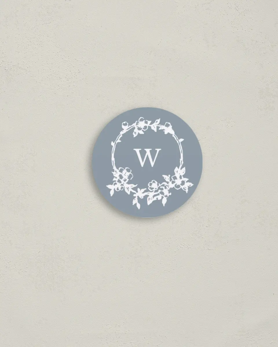 This is a 2" circle Envelope Seal called Flowering Frame printed in full color