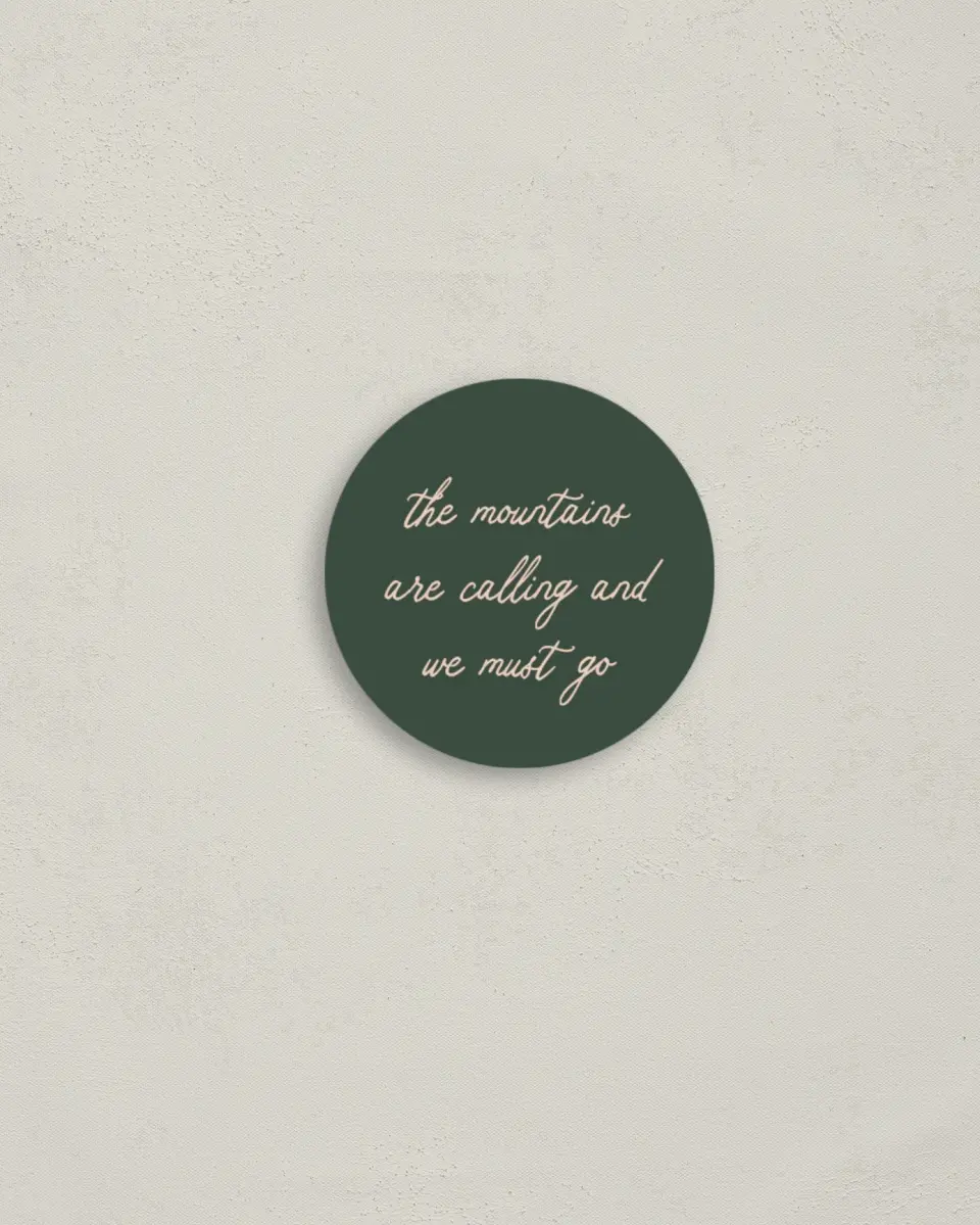 This is a 2" circle Envelope Seal called Elevated Adventures printed in full color