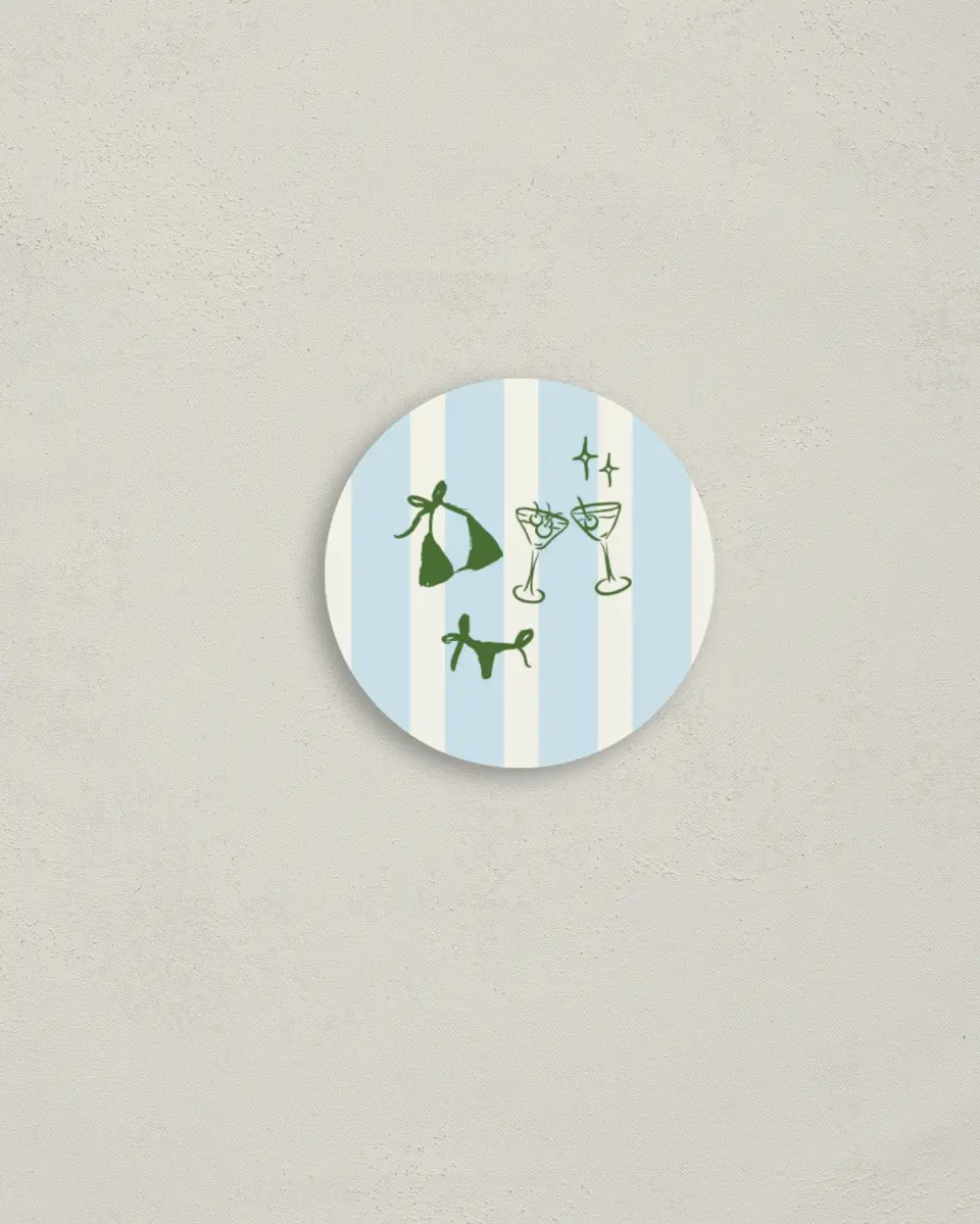 This is a 2" circle Bachelorette Party Accessorie called Bikinis & Martinis printed in full color