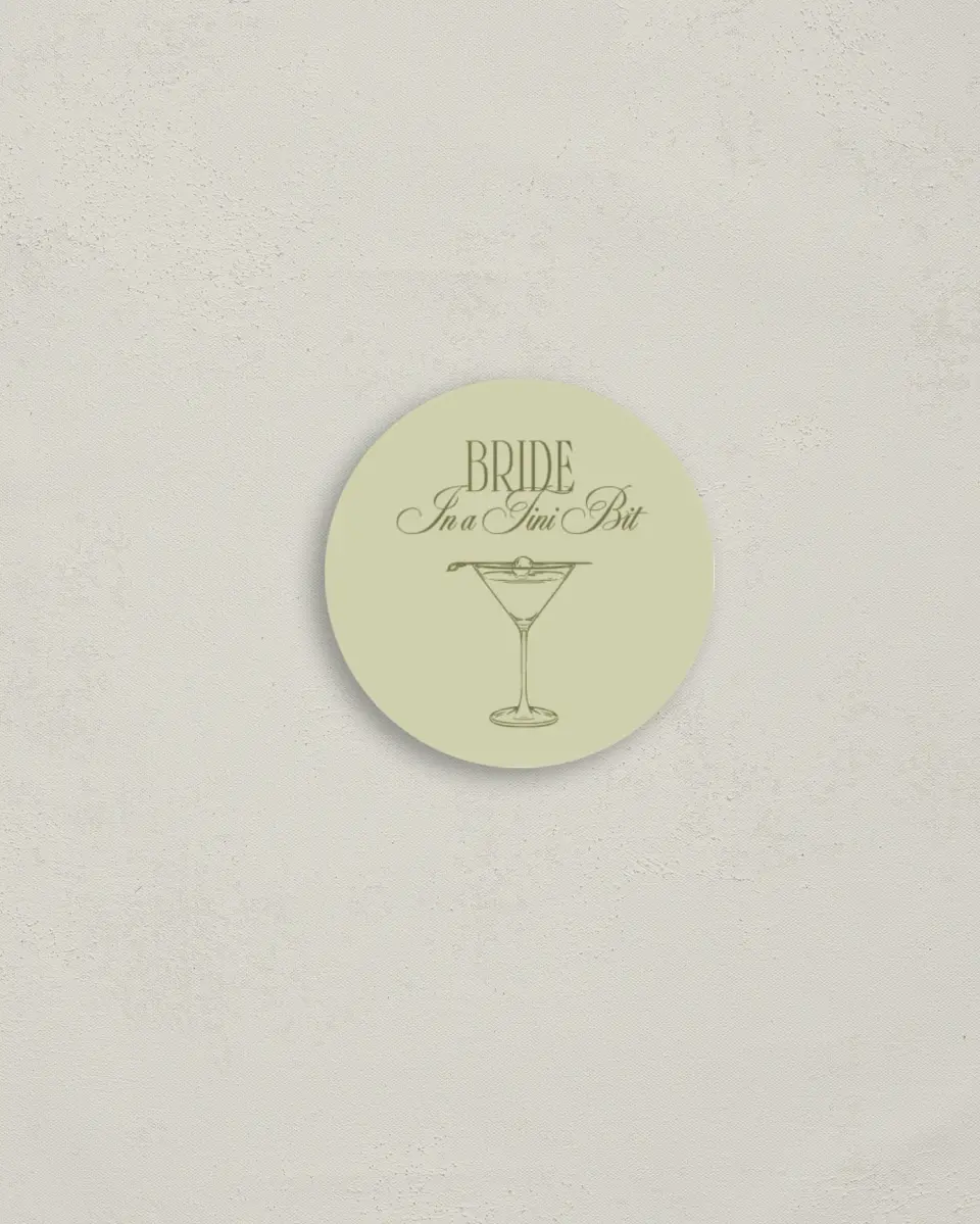 This is a 2" circle Bachelorette Party Accessorie called In a Tini Bit printed in full color