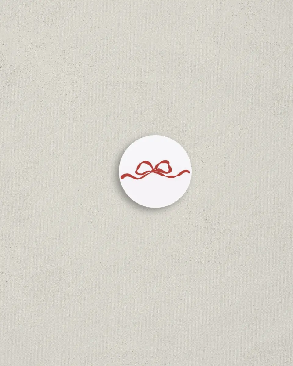 This is a 1¼" circle Envelope Seal called Holly & Mistletoe Magic printed in full color