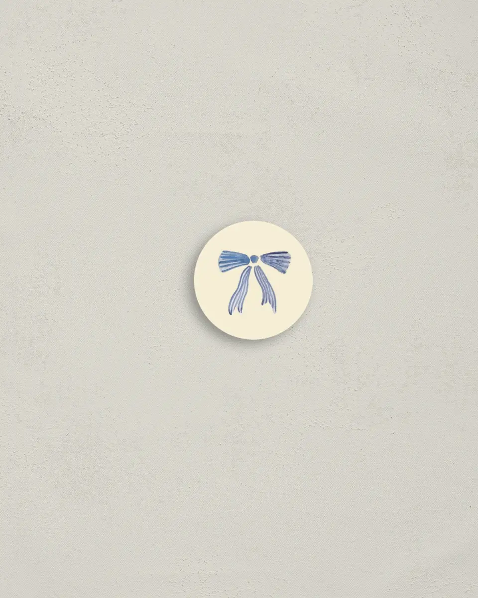 This is a 1¼" circle Envelope Seal called Ciao Baby printed in full color