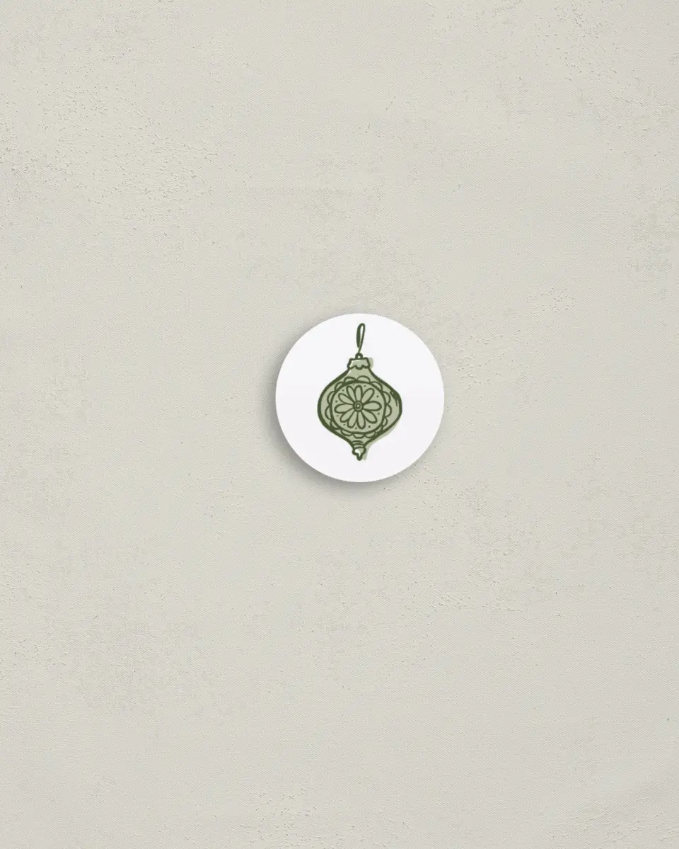 This is a 1¼" circle Envelope Seal called Baubled Boughs printed in full color