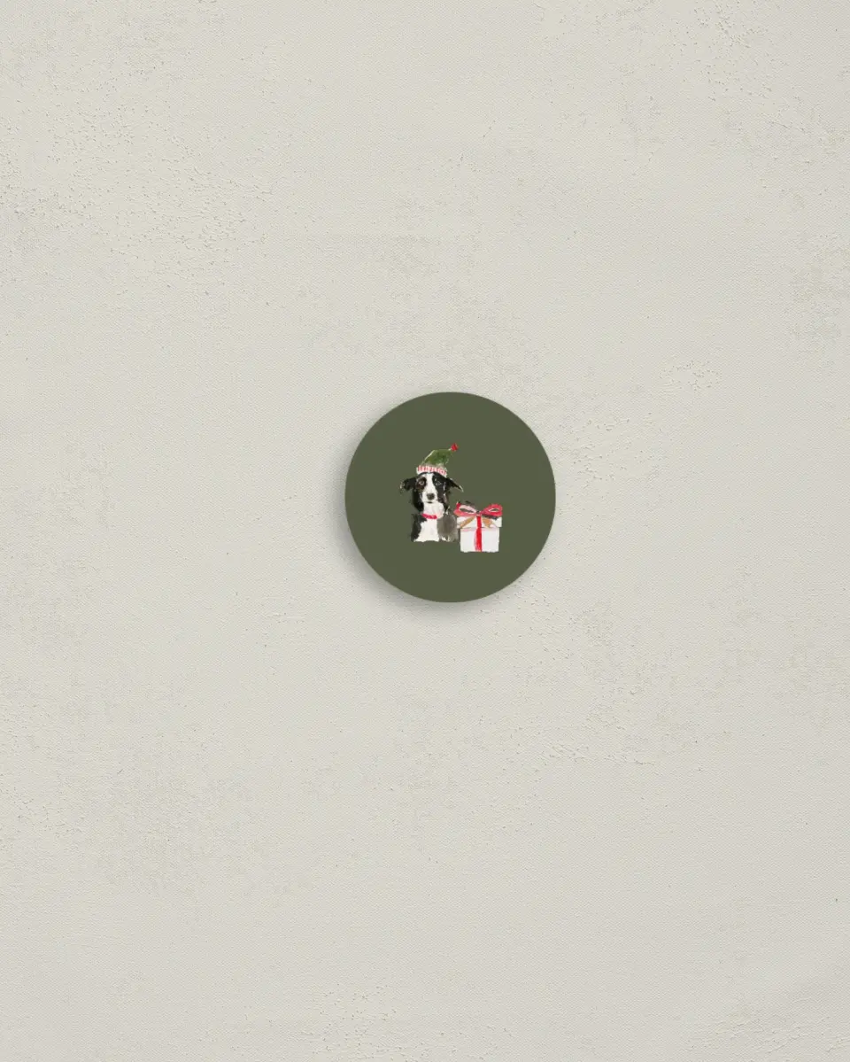 This is a 1¼" circle Envelope Seal called Woofing You Christmas printed in full color