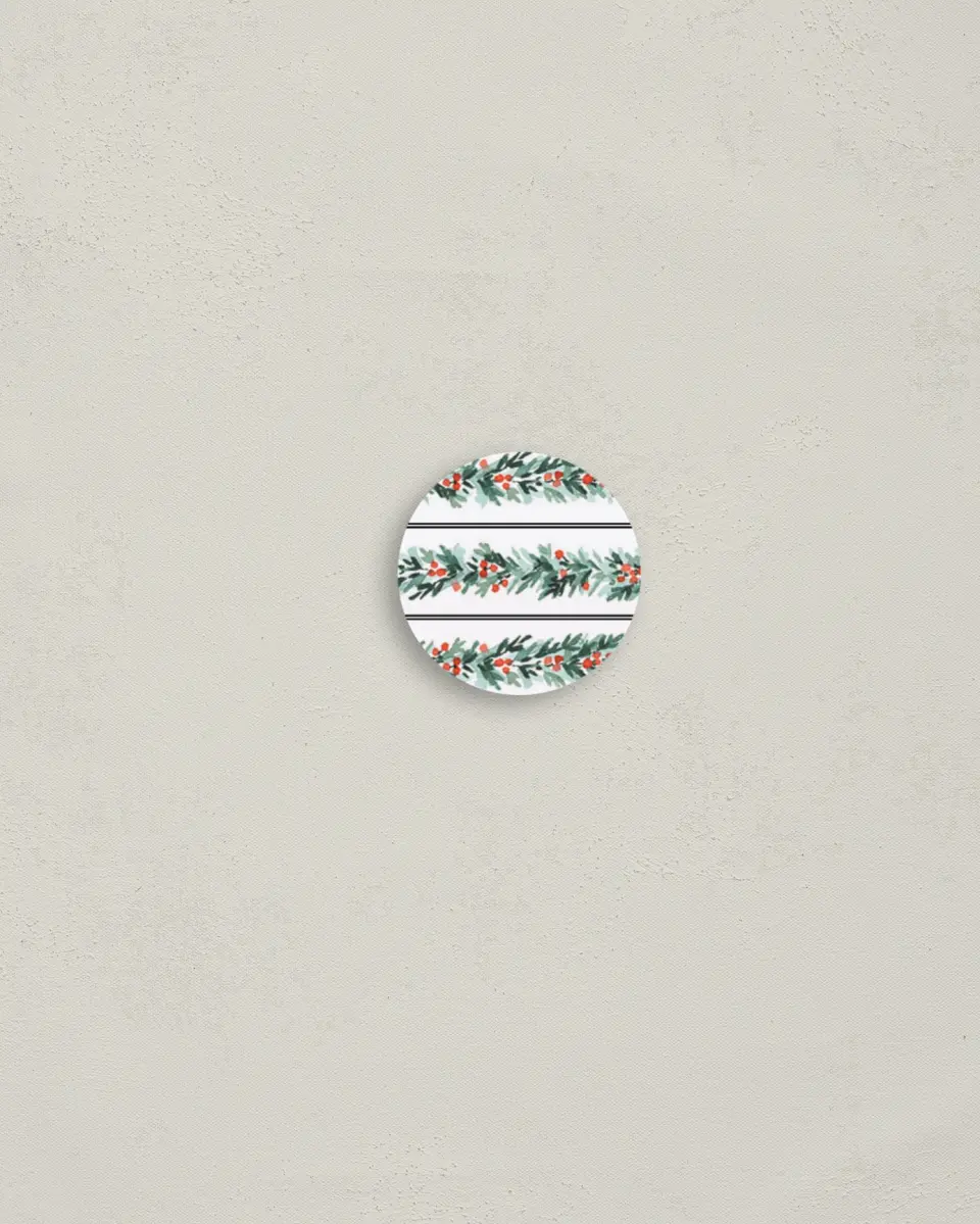 This is a 1¼" circle Envelope Seal called Holiday Baby printed in full color