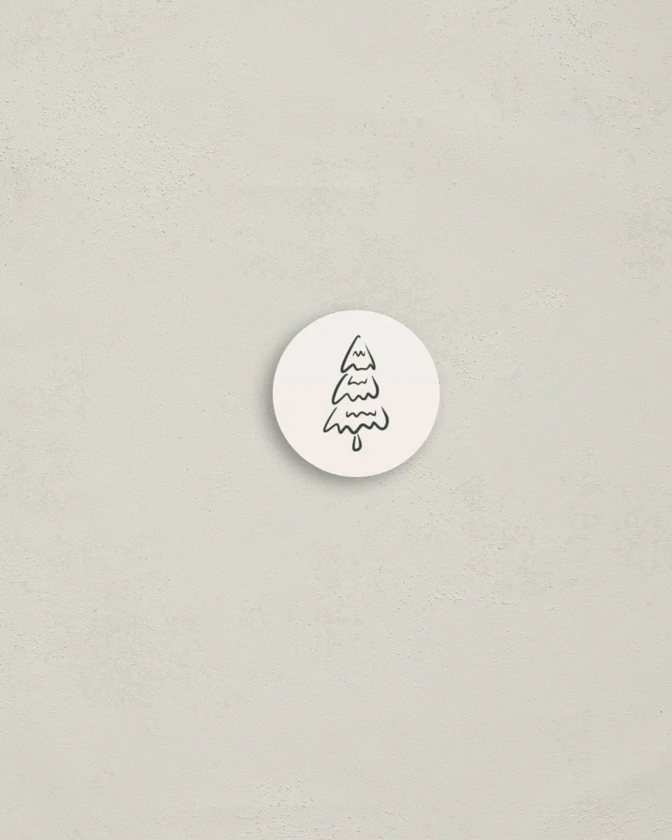 This is a 1¼" circle Envelope Seal called Script Christmas printed in full color