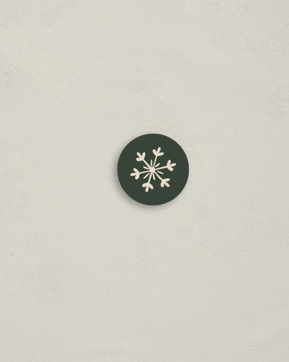 This is a 1¼" circle Envelope Seal called Merry Boughs printed in full color
