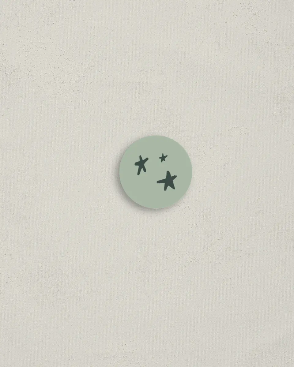 This is a 1¼" circle Envelope Seal called Playful Pines printed in full color