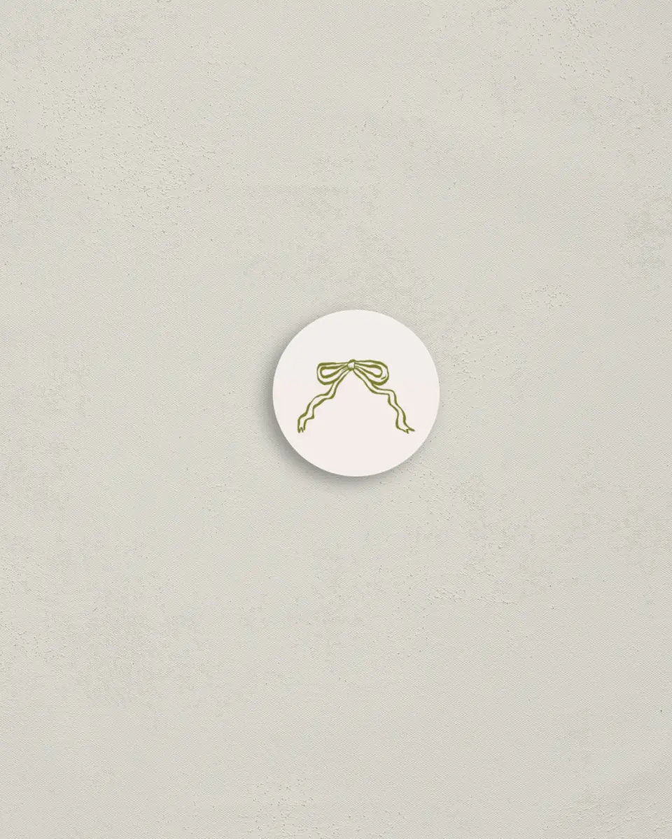 This is a 1¼" circle Envelope Seal called Wrapped in Joy printed in full color