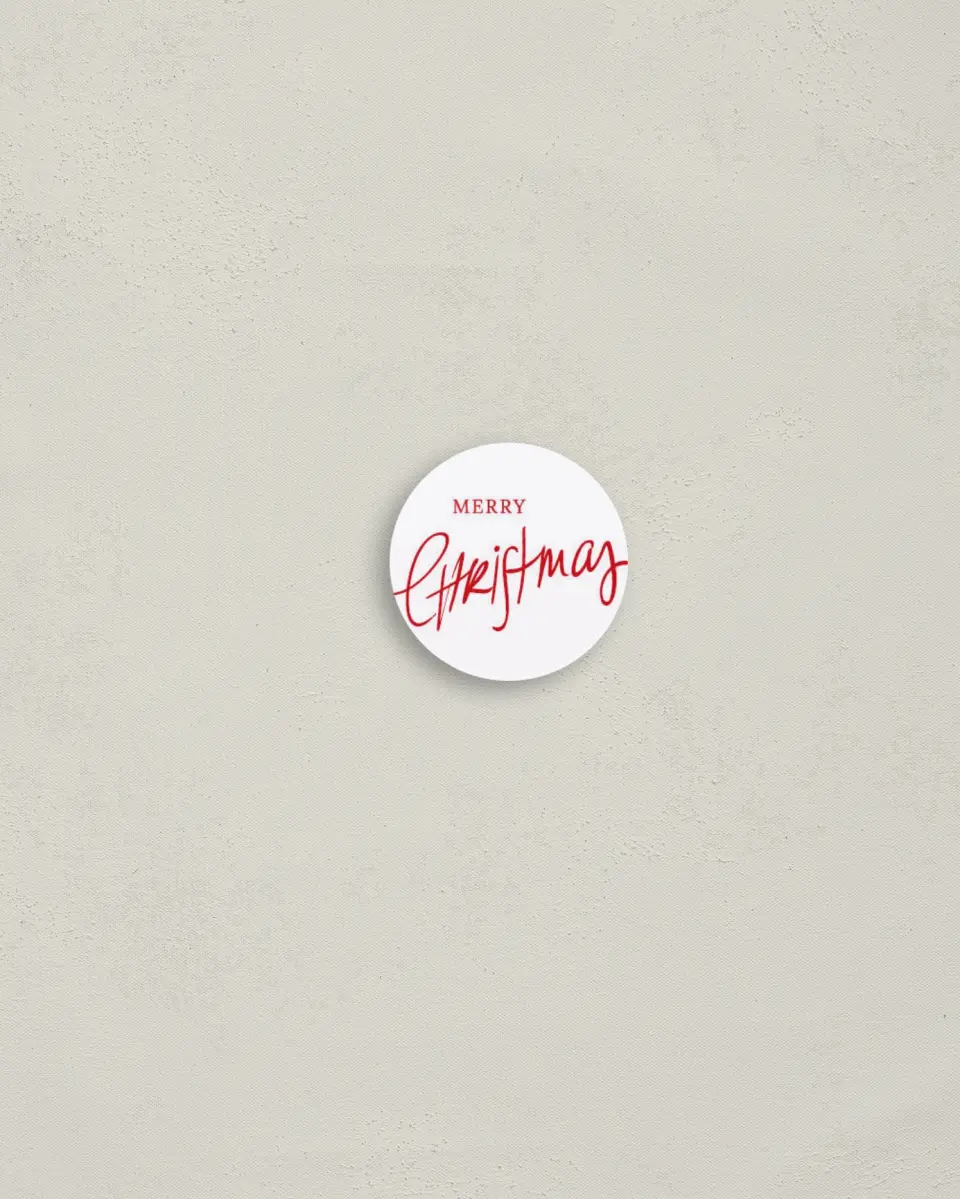 This is a 1¼" circle Envelope Seal called Celebrating Christmas printed in full color