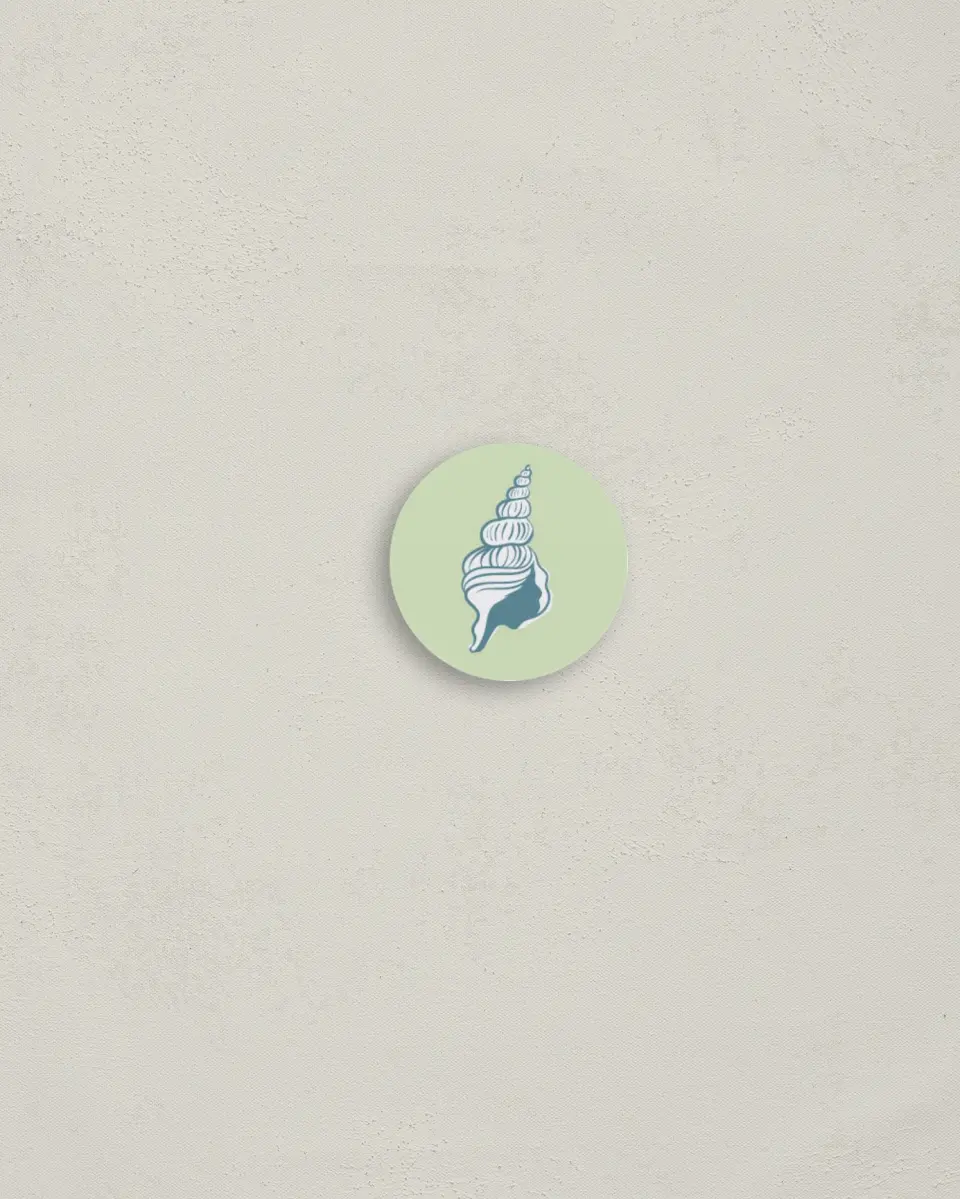 This is a 1¼" circle Envelope Seal called I Hear Wedding Shells printed in full color
