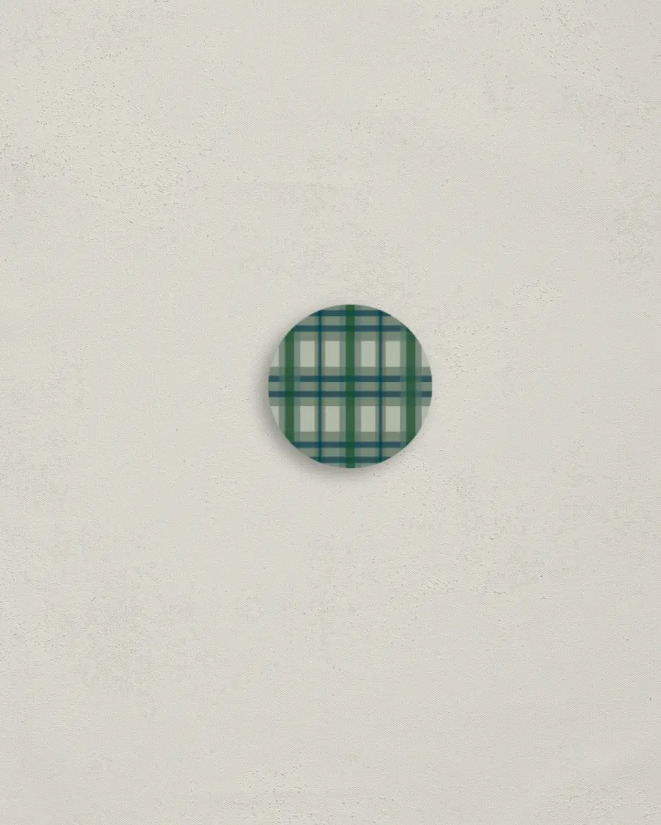 This is a 1¼" circle Envelope Seal called Winter Plaid printed in full color