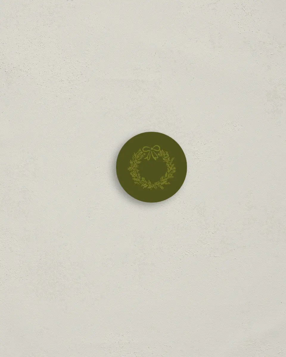 This is a 1¼" circle Envelope Seal called Holiday Weave printed in full color