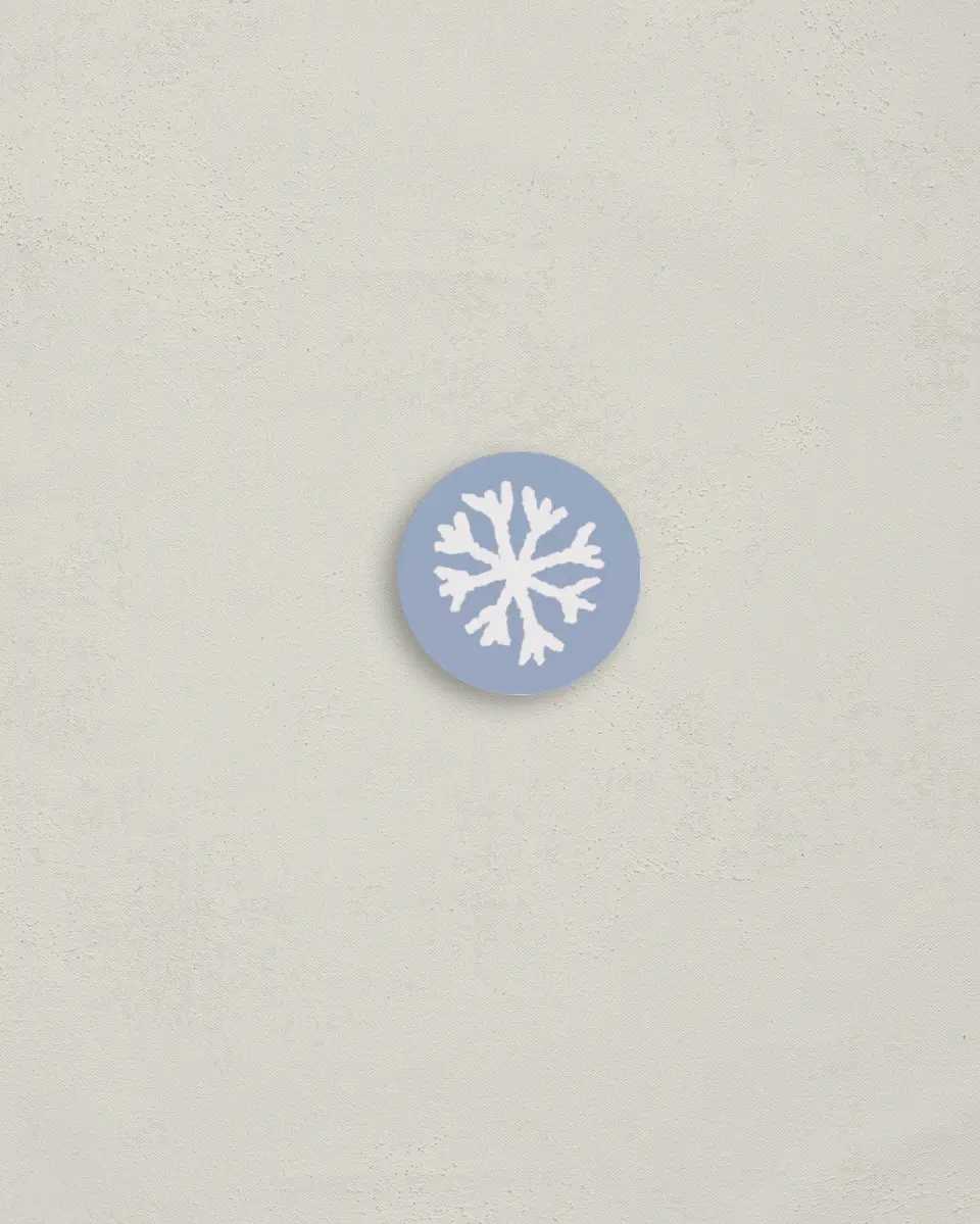 This is a 1¼" circle Envelope Seal called Glistening Snow printed in full color