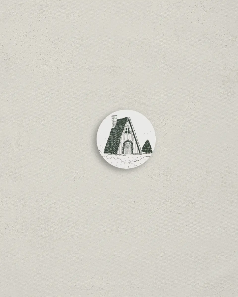 This is a 1¼" circle Envelope Seal called Cozy Snowy Cabin printed in full color