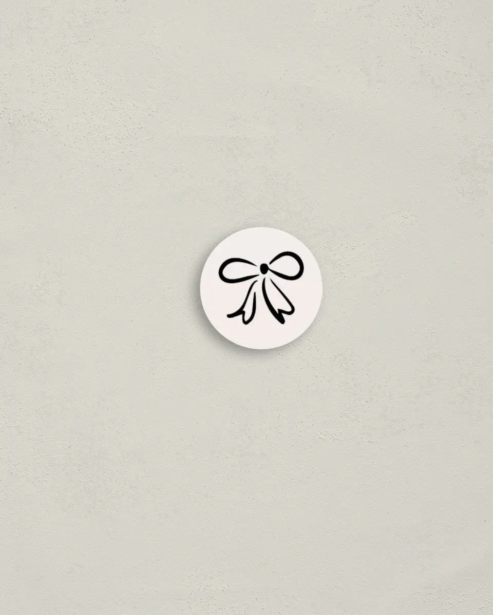 This is a 1¼" circle Envelope Seal called All Tied Up printed in full color