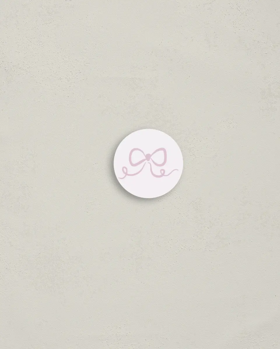 This is a 1¼" circle Envelope Seal called Bow Grad printed in full color