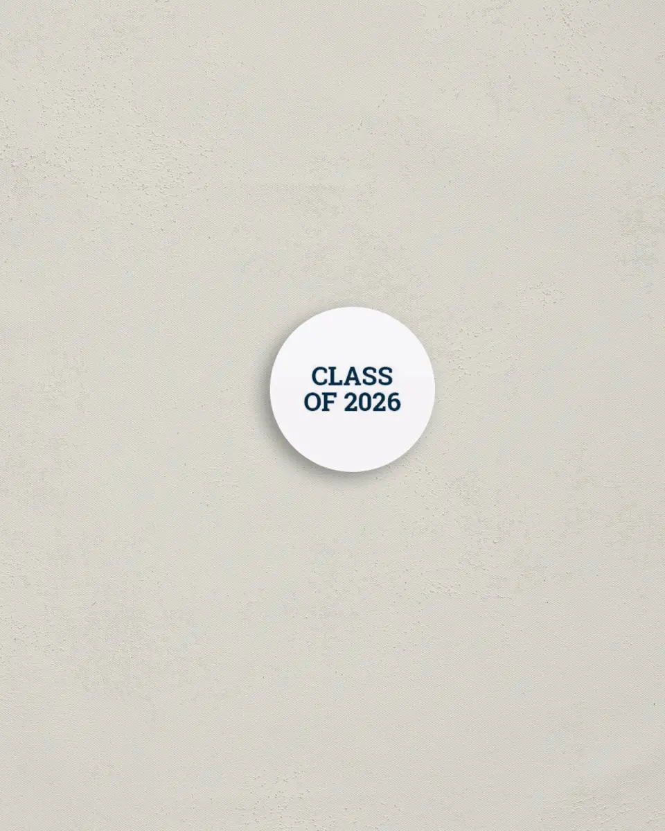This is a 1¼" circle Envelope Seal called Sports Graduate printed in full color