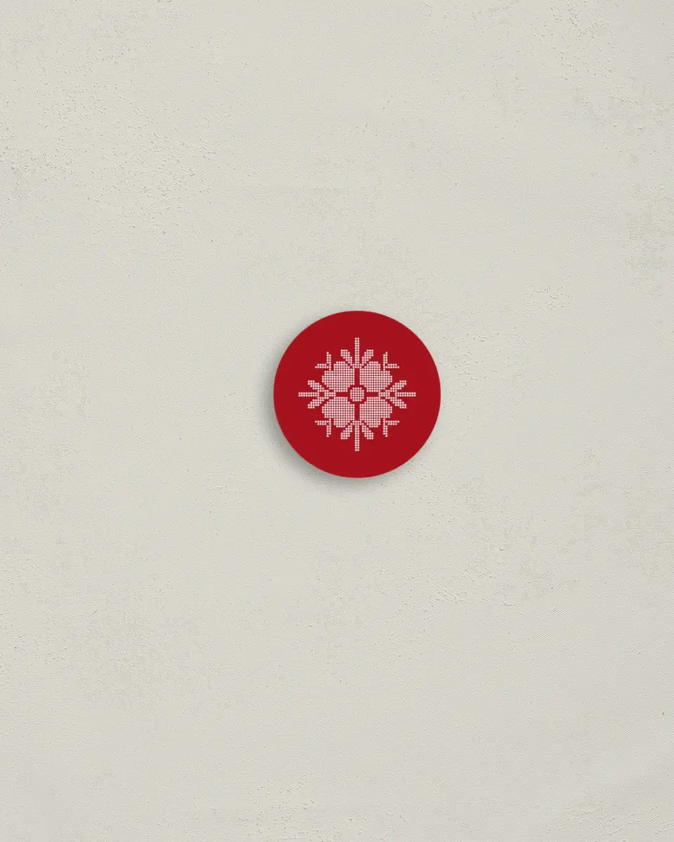 This is a 1¼" circle Envelope Seal called Nordic Knit printed in full color