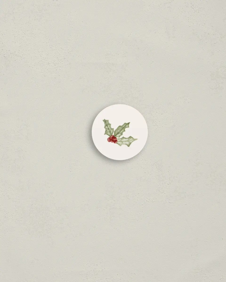 This is a 1¼" circle Envelope Seal called The Holly & the Ivy printed in full color