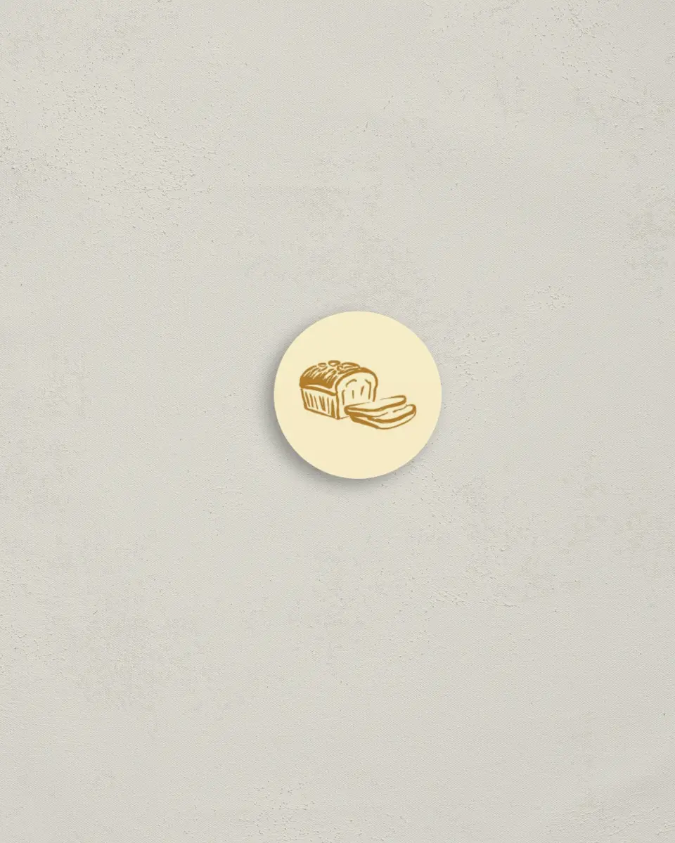 This is a 1¼" circle Envelope Seal called Toast to Baby printed in full color