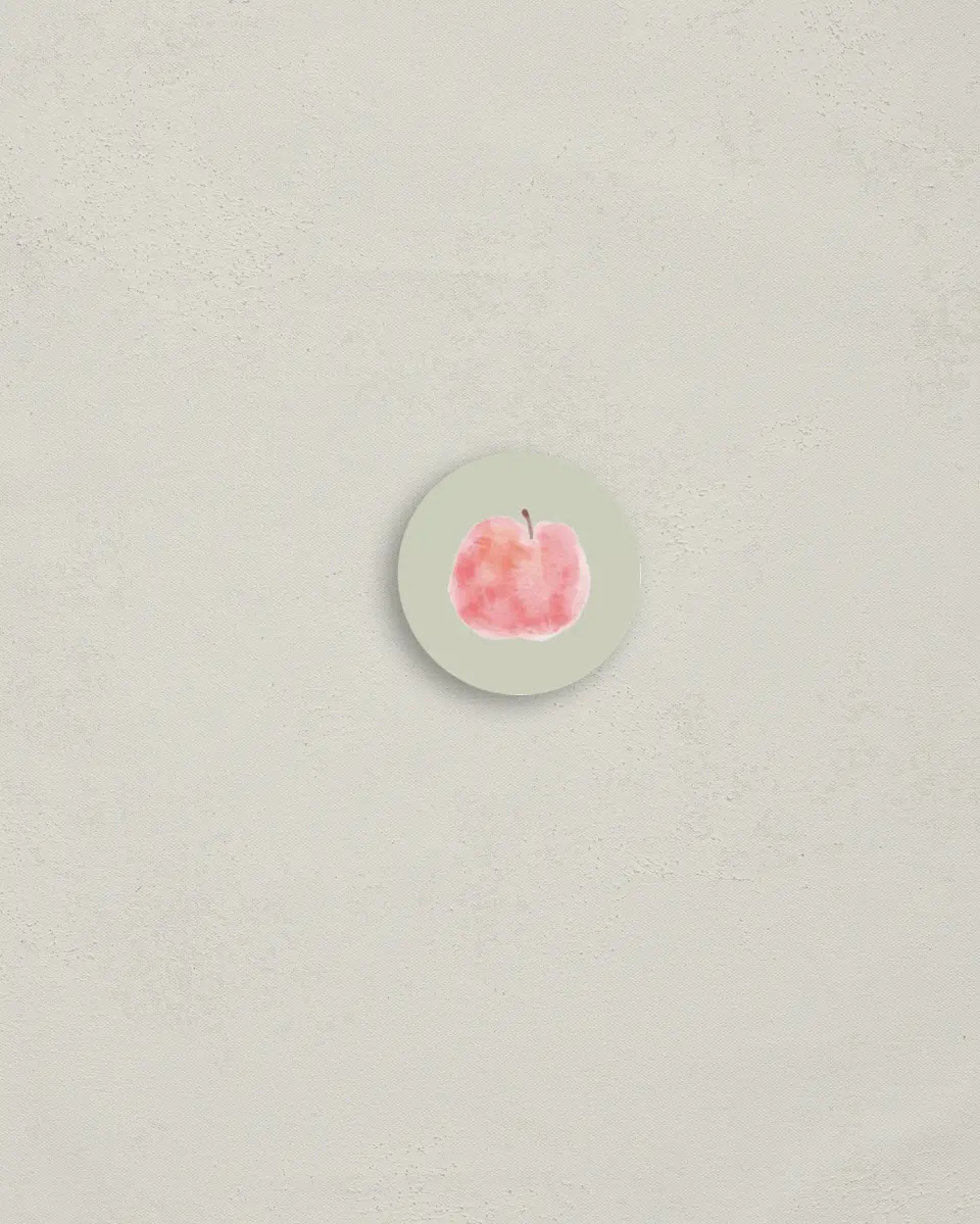 This is a 1¼" circle Envelope Seal called Apple of Our Eye printed in full color