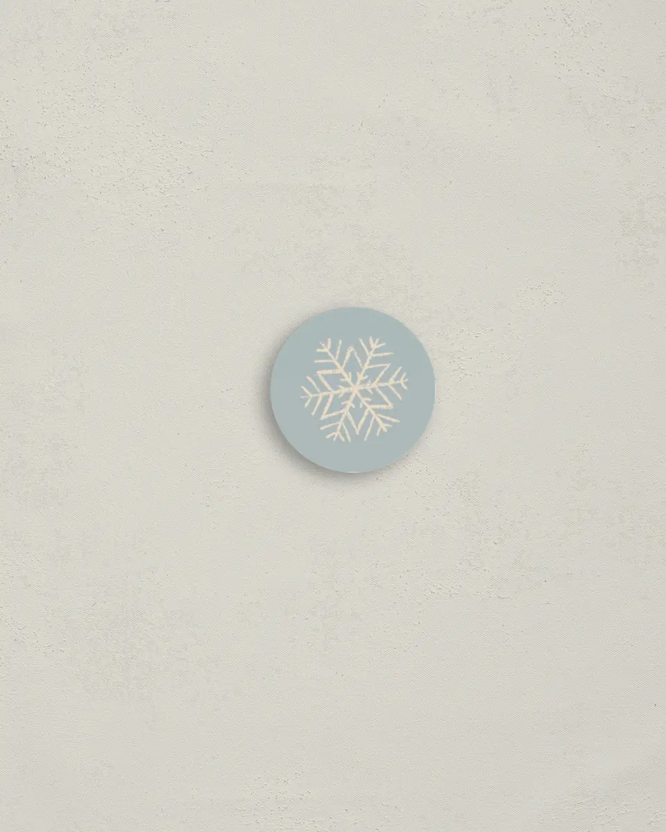 This is a 1¼" circle Envelope Seal called Sophisticated Snow printed in full color
